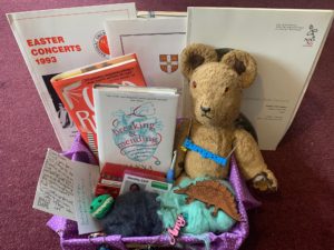 An example of a Museum of Me: a box containing personal objects, including a books, necklaces, a teddy, letters and more.